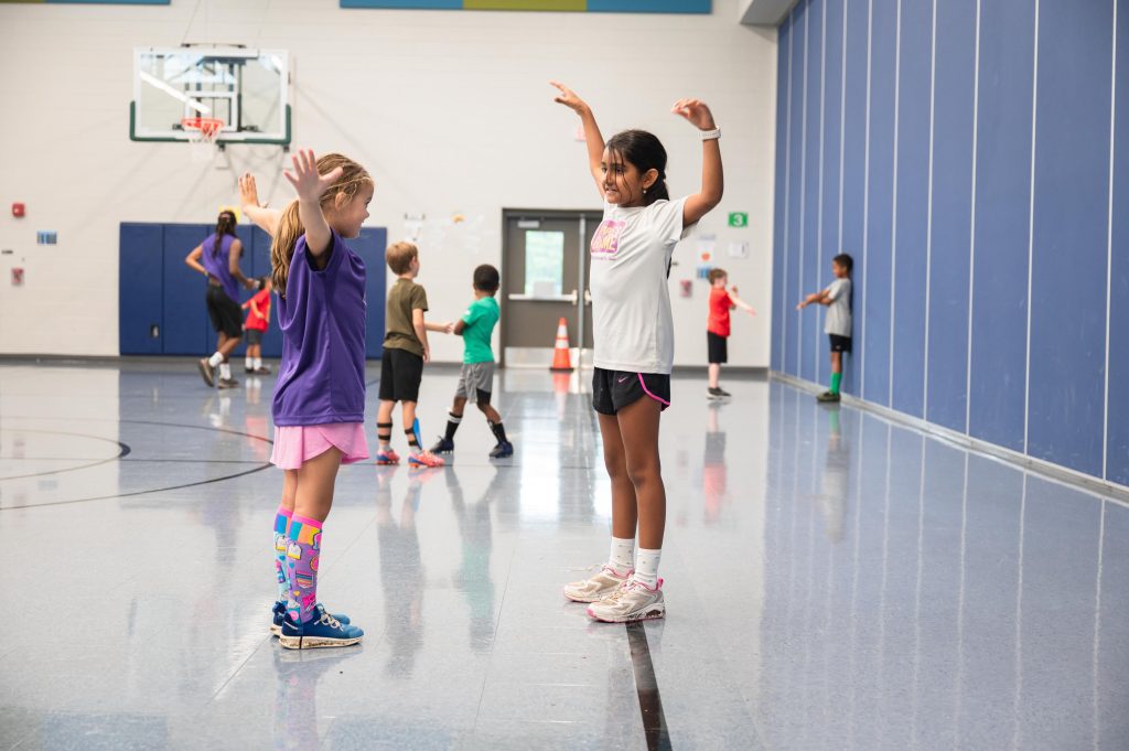The People's Game players practice team-building.