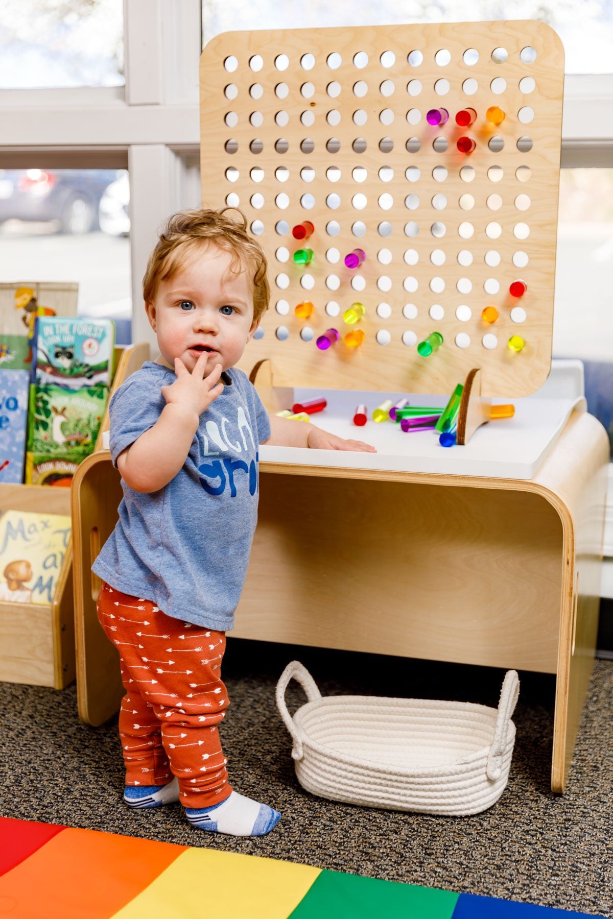 A young child plays at The Wonder Lab, a STEM-focused experience in Durham for children 6 and under
