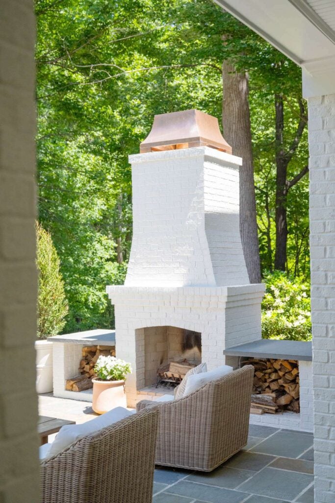 The wood-burning fireplace on the Serrano's outdoor patio.