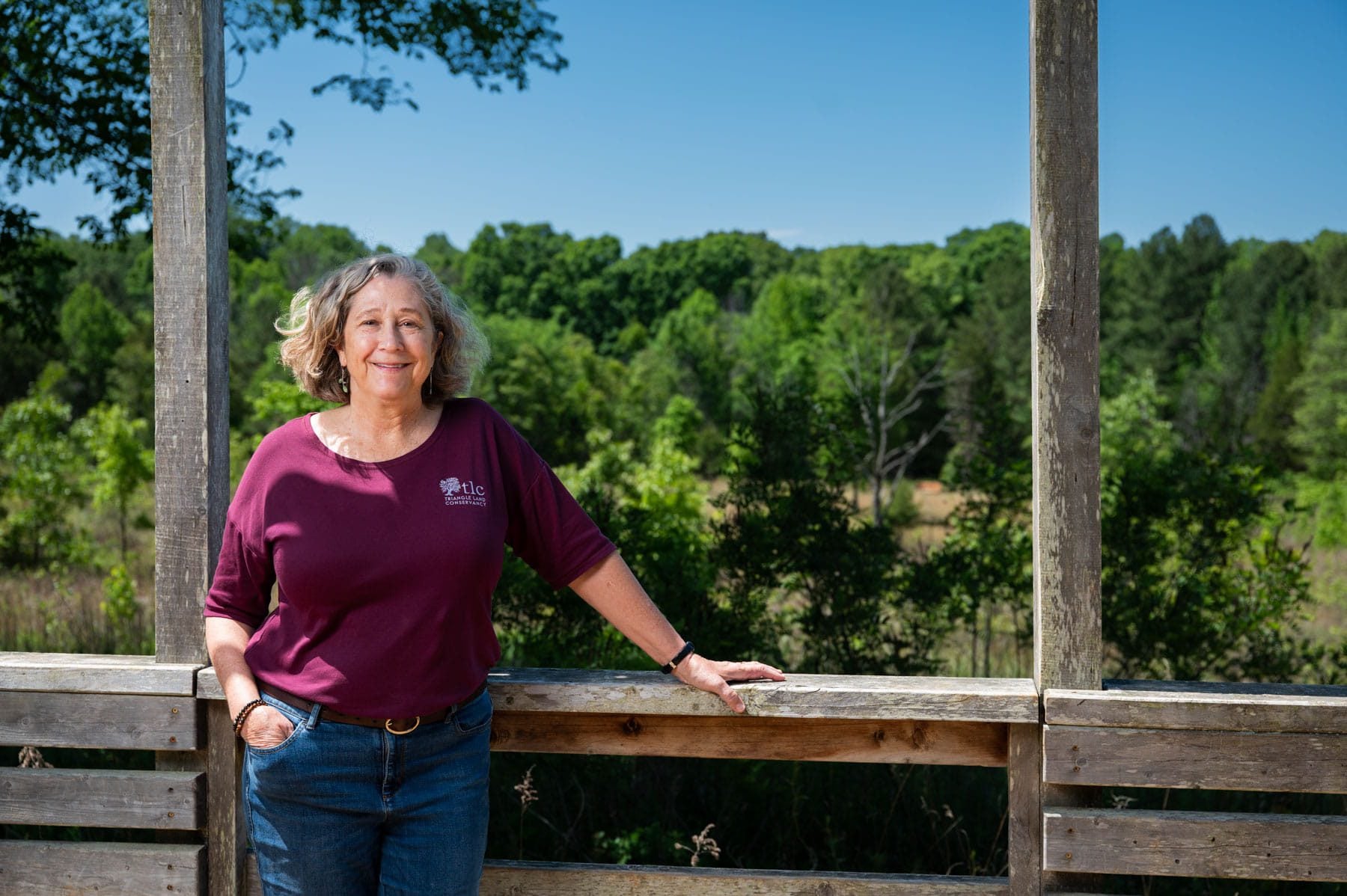 Sandy Sweitzer of Triangle Land Conservancy posing for a portrait at the Horton Grove Nature Preserve.