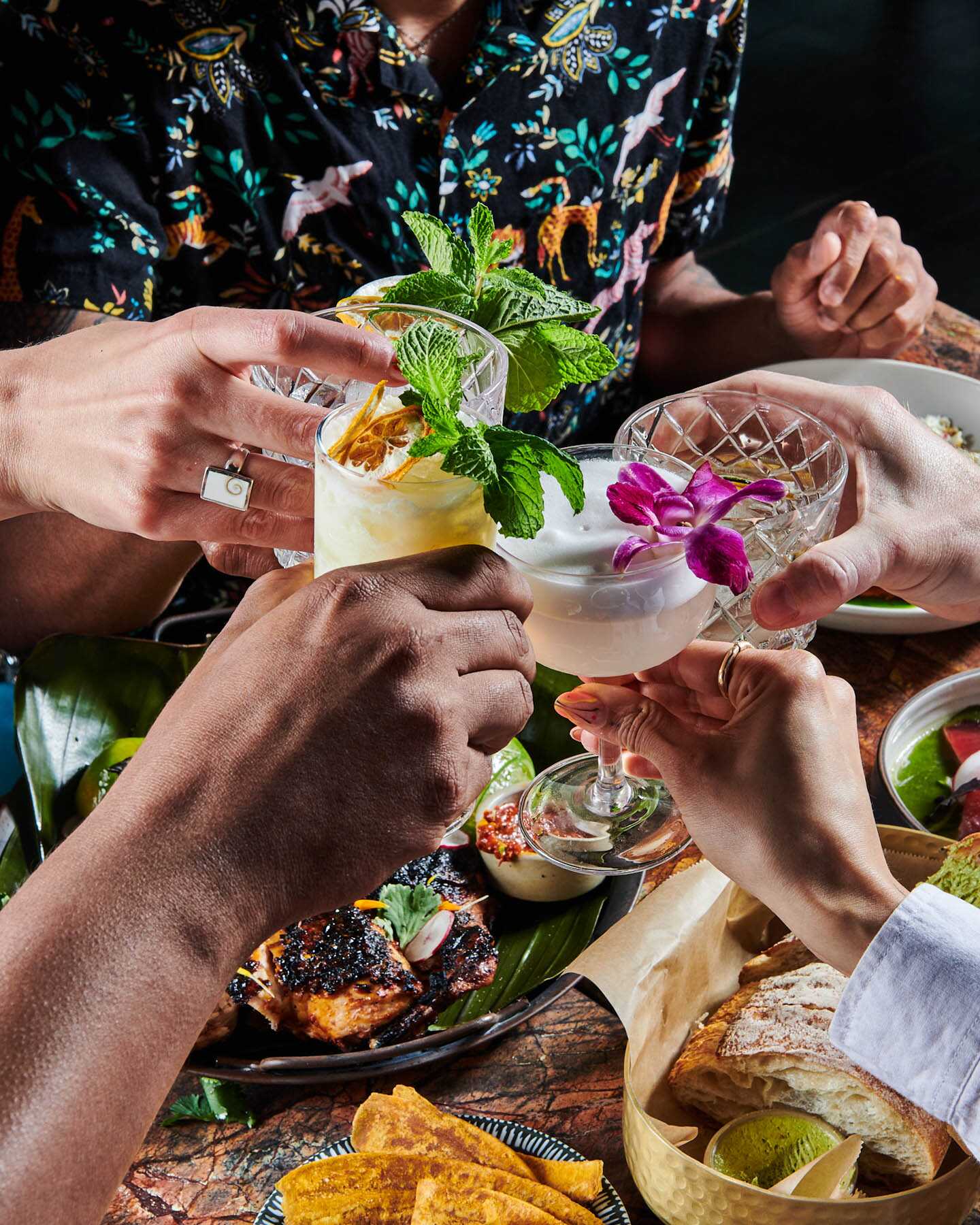 A toast of cocktails over dinner at Little Bull.
