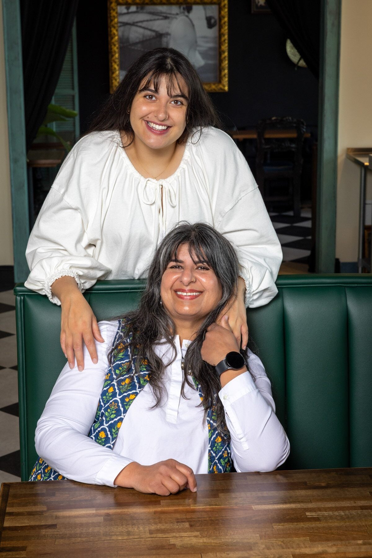 Amy Waas and Preeti Waas pose for a portrait at their restaurant, Cheeni Indian Food Emporium