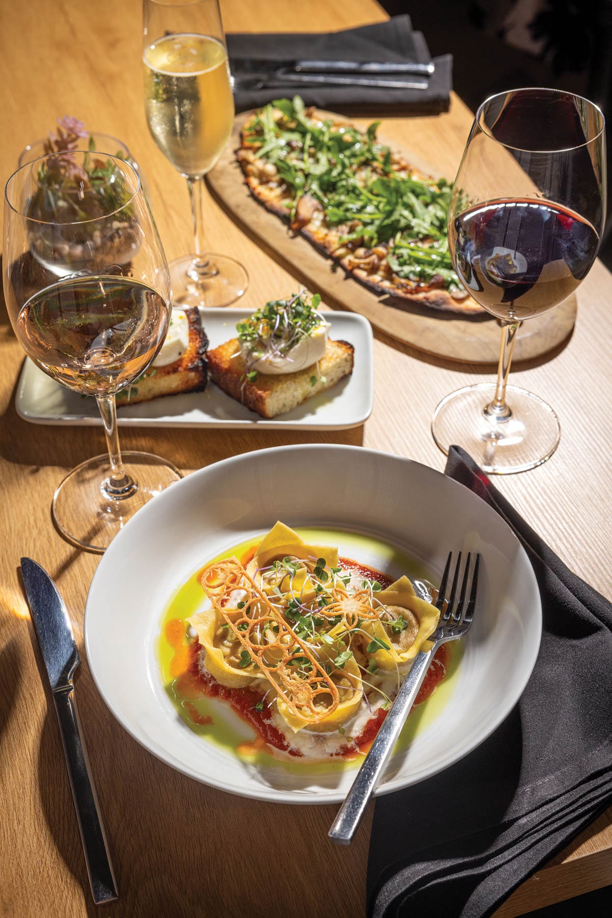 A selection of pasta, flatbreads and wine from The Wine Feed.