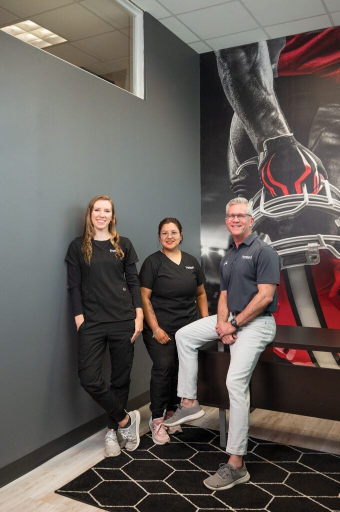 Staff of Gameday Men's Health Clinic in Durham pose for a photo. 