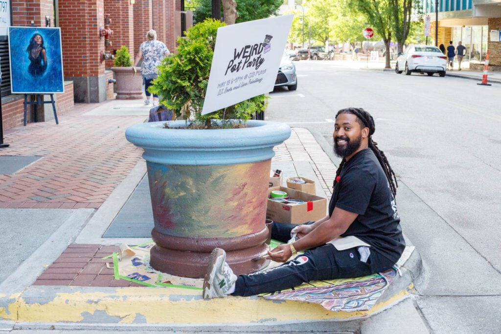 Artist Jerome Chesson designs a planter as a part of Weird Productions' Weird Pot Party.
