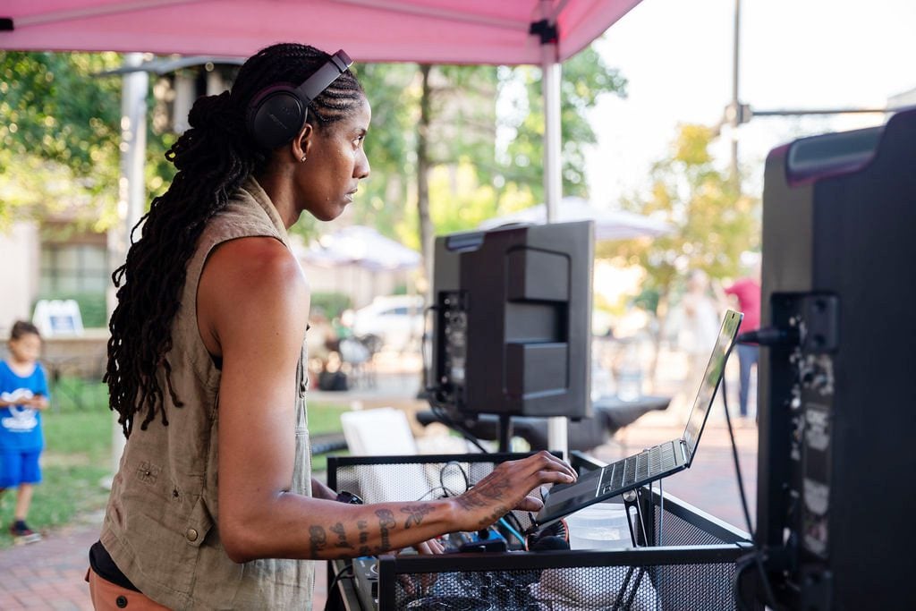 DJ Bre sets the vibe with music for Third Party goers to enjoy while they stroll and browse.