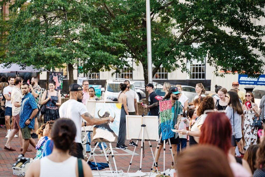 Weird Productions hosted a Canvas Clash painting event in CCB Plaza during a 2025 Third Friday.