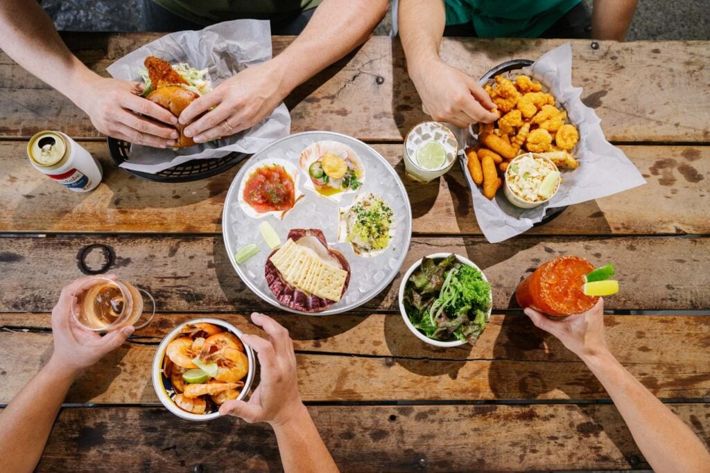 Jean's "By the Sea" in Durham features fresh seafood including fried, grilled or blackened fish, peel-and-eat shrimp, raw oysters, as well as hushpuppies, cole slaw and craft cocktails.