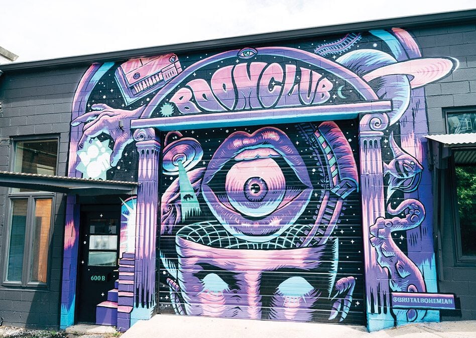 Zac Bender’s colorful mural on the exterior of BOOM Club in Durham, North Carolina